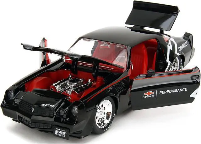 Alt view image 2 of 11 - 1979 Chevrolet Camaro Z28 "Chevrolet Performance" Black with Carbon Hood and Red Interior 1/24 Die Cast Model Car by Jada