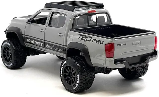 Alt view image 3 of 7 - 2023 Toyota Tacoma TRD PRO Off Road Truck Cement Gray with Black Hood and Roofrack 1/27 Diecast Model Car by Maisto