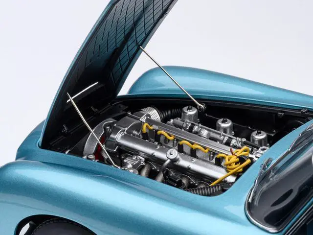 Alt view image 4 of 6 - Aston Martin DB5 RHD (Right Hand Drive) Caribbean Pearl Blue Metallic 1/18 Model Car by Autoart