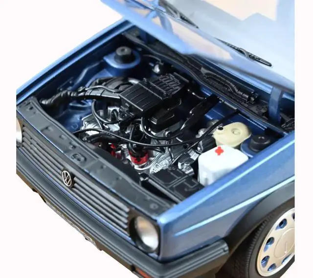 Alt view image 3 of 6 - 1988 Volkswagen Golf "10 Million" Star Blue Metallic 1/18 Diecast Model Car by Norev