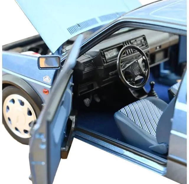 Alt view image 4 of 6 - 1988 Volkswagen Golf "10 Million" Star Blue Metallic 1/18 Diecast Model Car by Norev