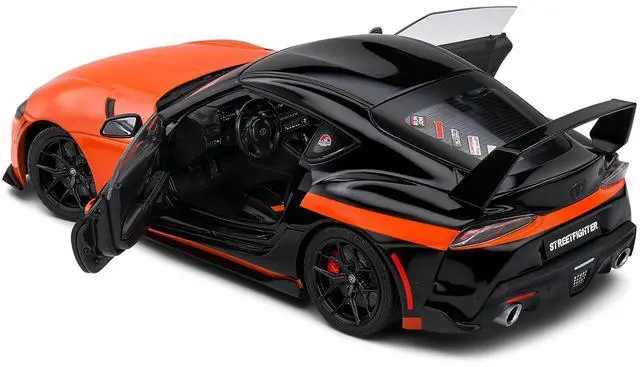 Alt view image 4 of 6 - 2024 Toyota GR Supra "StreetFighter" Orange and Black 1/18 Diecast Model Car by Solido