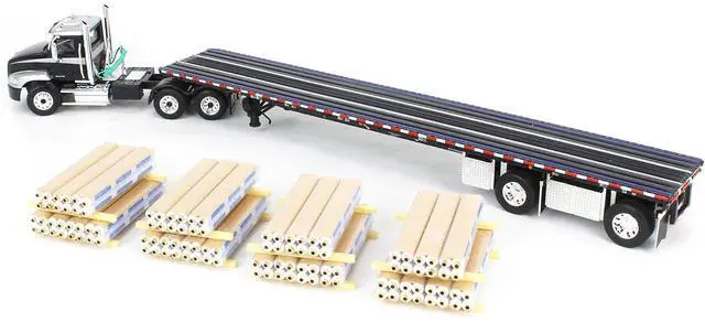 Alt view image 5 of 6 - Mack Pinnacle Day Cab w/Minimizer Parts & 53' Wilson Flatbed w/Pallets Black w/Silver 1/64 Diecast Model by DCP/First Gear