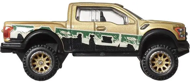 Alt view image 3 of 6 - 2017 Ford F-150 Raptor Pickup Truck Gold Metallic with Graphics "HW Off Road" Series Diecast Model Car by Hot Wheels