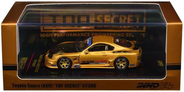 Alt view image 6 of 6 - Toyota Supra (A80) "Top Secret" GT300 RHD Gold Metallic with Carbon Hood 1/64 Diecast Model Car by Inno Models