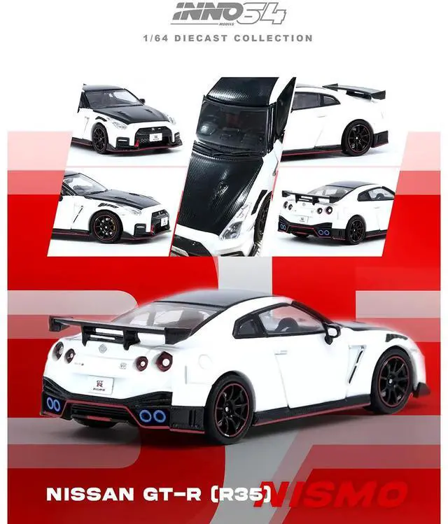 Alt view image 4 of 6 - Nissan GT-R (R35) Nismo RHD (Right Hand Drive) White with Carbon Hood and Top 1/64 Diecast Model Car by Inno Models