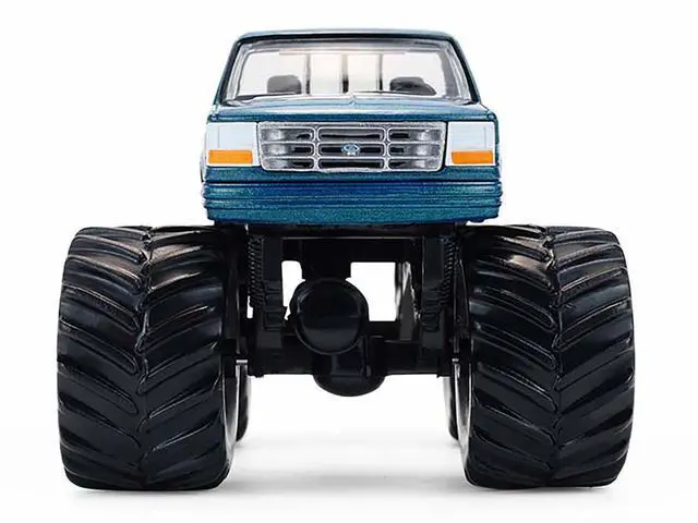 Alt view image 4 of 6 - 1993 Ford F-250 Monster Truck "Northern Storm" Teal Metallic "Kings of Crunch" 1/64 Diecast Model Cars by Greenlight