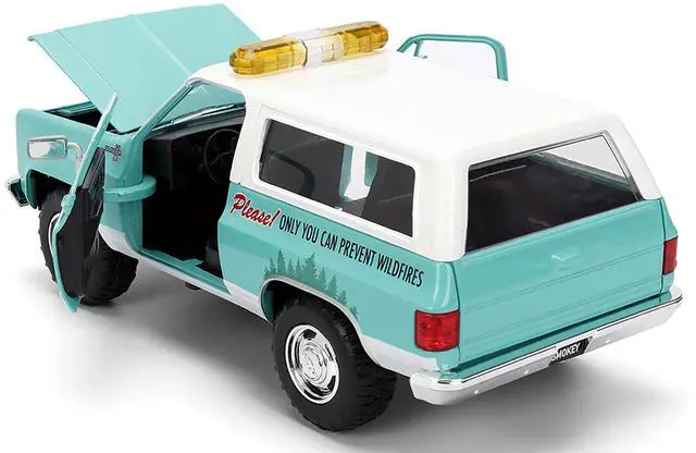 Alt view image 5 of 6 - 1980 Chevrolet Blazer Light Green with White Top and Graphics and Smokey Bear Diecast Figure 1/24 Diecast Model by Jada