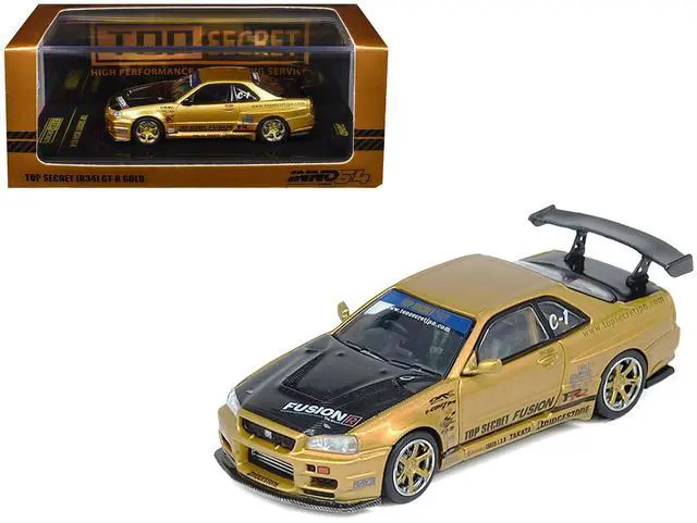 Main image of Nissan Skyline GT-R (R34) RHD "Top Secret" Gold Metallic with Carbon Hood and Trunk 1/64 Diecast Model Car by Inno Models