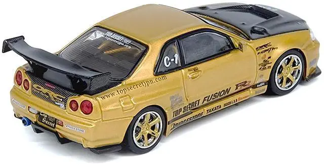 Alt view image 3 of 6 - Nissan Skyline GT-R (R34) RHD "Top Secret" Gold Metallic with Carbon Hood and Trunk 1/64 Diecast Model Car by Inno Models