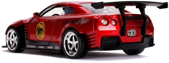 Alt view image 4 of 5 - 2009 Nissan GT-R (R35) Candy Red and Red Ranger Diecast Figurine "Power Rangers" 1/24 Diecast Model Car by Jada