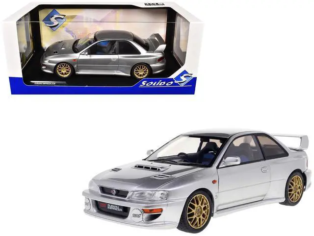 Main image of 1998 Subaru Impreza 22B RHD (Right Hand Drive) Silver Metallic with Gold Wheels 1/18 Diecast Model Car by Solido