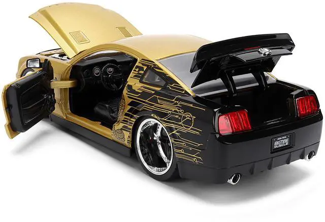 Alt view image 4 of 6 - 2008 Ford Shelby Mustang GT-500KR Gold Metallic and Black with Graphics "Bigtime Muscle" Series 1/24 Die Cast Model Car by Jada