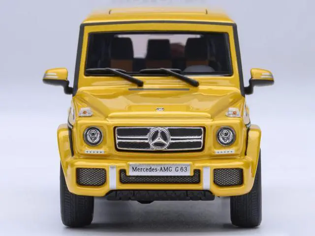 Alt view image 4 of 6 - 2017 Mercedes-Benz AMG G 63 Solar Beam Yellow 1/64 Diecast Model Car by Autoart
