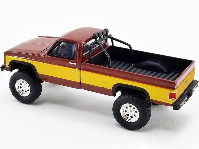 Alt view image 6 of 6 - 1986 Chevrolet K-20 Pickup Truck Brown Met. w/Gold Stripes Stacey David's Fall Guy 1/64 Diecast Model Car by Greenlight for ACME