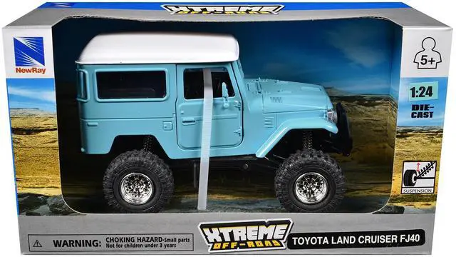 Alt view image 3 of 3 - Toyota Land Cruiser FJ40 Light Blue with White Top "Xtreme Off-Road" Series 1/24 Diecast Model by New Ray