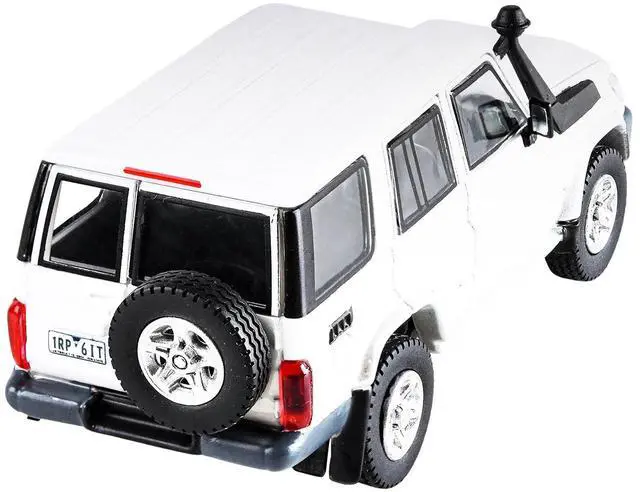 Alt view image 4 of 5 - Toyota Land Cruiser 76 French Vanilla Pearl White 1/64 Diecast Model Car by Paragon