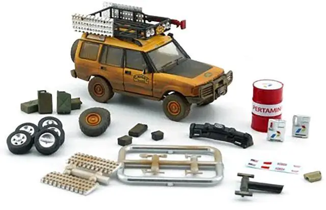 Alt view image 2 of 3 - Land Rover Discovery 1 RHD "Camel Trophy" Yellow (Dirty Version) w/Rack and Accessories 1/64 Diecast Model Car by BM Creations