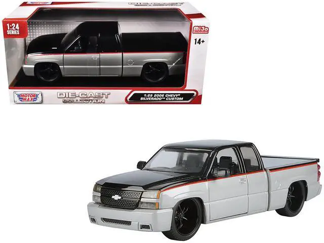 Main image of 2006 Chevrolet Silverado Custom Truck Silver Metallic and Black with Red "Die-Cast Collection" 1/25 Diecast Model by Motormax