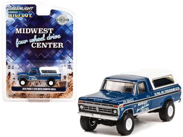 Main image of 1974 Ford F-250 Truck w/Camper Shell Blue Met. w/Black Stripes "Bigfoot" 1/64 Diecast Model Car by Greenlight