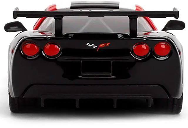 Alt view image 5 of 6 - 2005 Chevrolet Corvette C6R #16 White with Black and Red Graphics "Collection" Series 1/64 Diecast Model Car by Majorette