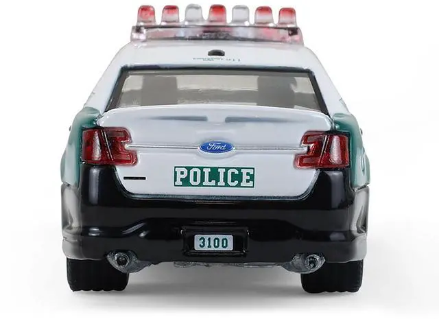 Alt view image 4 of 5 - 2014 Ford Taurus "NYPD Vintage Tribute Livery" Green and Black with White 1/64 Diecast Model Car by Greenlight