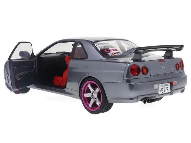 Alt view image 2 of 6 - 1999 Nissan Skyline GT-R (R34) RHD (Right Hand Drive) Silver Metallic with Purple Wheels 1/18 Diecast Model Car by Solido