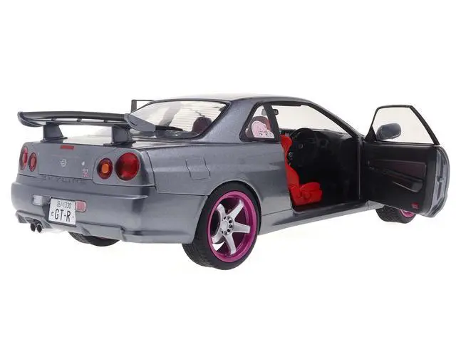 Alt view image 4 of 6 - 1999 Nissan Skyline GT-R (R34) RHD (Right Hand Drive) Silver Metallic with Purple Wheels 1/18 Diecast Model Car by Solido