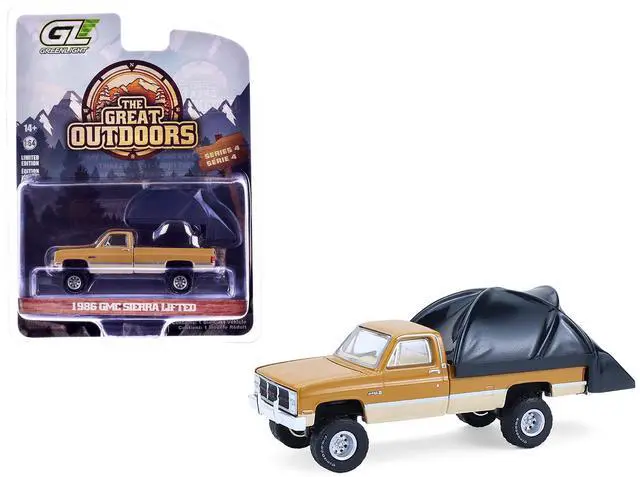 Main image of 1986 GMC Sierra Lifted Truck Desert Sand and Doeskin Tan with Truck Bed Tent 1/64 Scale Diecast Model Cars by Greenlight