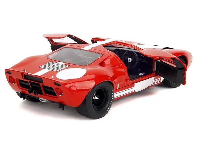 Alt view image 5 of 6 - Ford GT40 MK1 Red with White Stripes and Graphics "Pink Slips" Series 1/18 Diecast Model Car by Jada