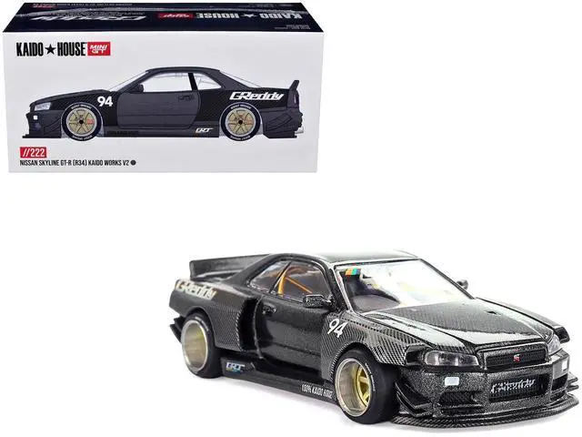 Main image of Nissan Skyline GT-R (R34) RHD #94 "Kaido Works GReddy V2" Carbon Fiber and Dark Gray Metallic 1/64 Diecast Model Car by Mini GT