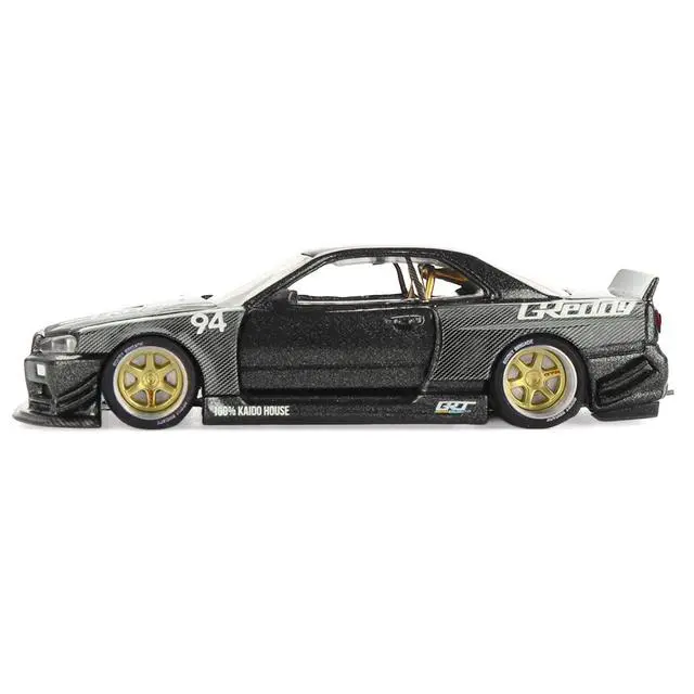 Alt view image 3 of 6 - Nissan Skyline GT-R (R34) RHD #94 "Kaido Works GReddy V2" Carbon Fiber and Dark Gray Metallic 1/64 Diecast Model Car by Mini GT