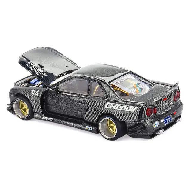 Alt view image 4 of 6 - Nissan Skyline GT-R (R34) RHD #94 "Kaido Works GReddy V2" Carbon Fiber and Dark Gray Metallic 1/64 Diecast Model Car by Mini GT