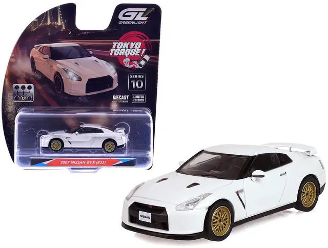 Main image of 2007 Nissan GT-R (R35) Pearl White with Gold Wheels "Tokyo Torque" Series 10 1/64 Diecast Model Car by Greenlight