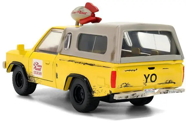 Alt view image 5 of 7 - Pizza Planet Truck Yellow (Weathered) w/Beige Camper "Toy Story" 1995 Movie "Hollywood Rides" 1/32 Diecast Model Car by Jada
