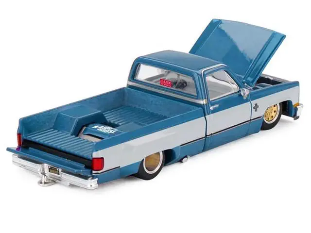 Alt view image 4 of 6 - Chevrolet Silverado Dually Truck "Vintage Spec V1" Light Blue Met w/White Sides and Interior 1/64 Diecast Model Car by Mini GT