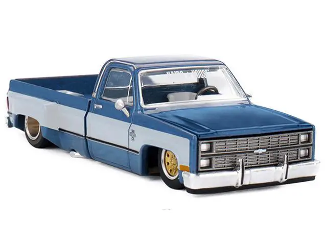 Alt view image 6 of 6 - Chevrolet Silverado Dually Truck "Vintage Spec V1" Light Blue Met w/White Sides and Interior 1/64 Diecast Model Car by Mini GT