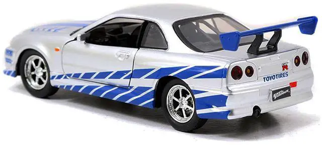 Alt view image 3 of 5 - Brian's Nissan Skyline GT-R (R34) RHD Silver Metallic with Blue "Fast & Furious 25th Anniversary" 1/32 Diecast Car Model by Jada