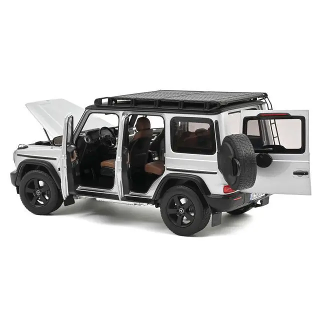 Alt view image 2 of 7 - 2024 Mercedes-Benz G-Class Professional Iridium Silver Metallic with Black Top and Roof Rack 1/18 Diecast Model Car by Norev
