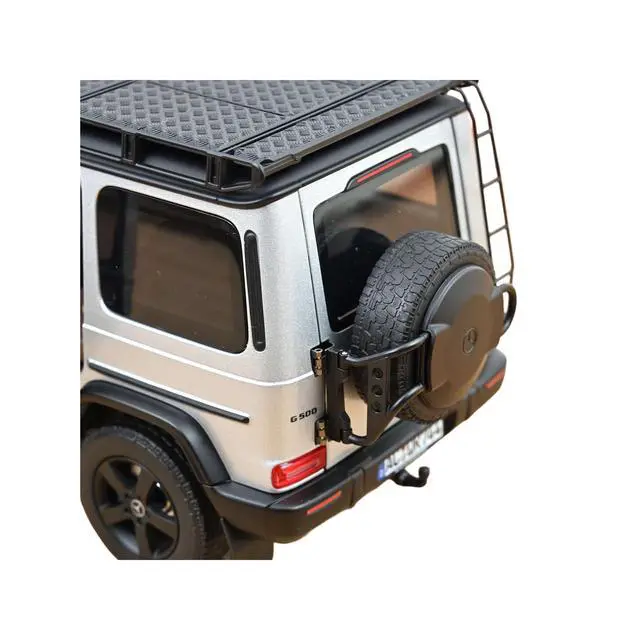 Alt view image 6 of 7 - 2024 Mercedes-Benz G-Class Professional Iridium Silver Metallic with Black Top and Roof Rack 1/18 Diecast Model Car by Norev