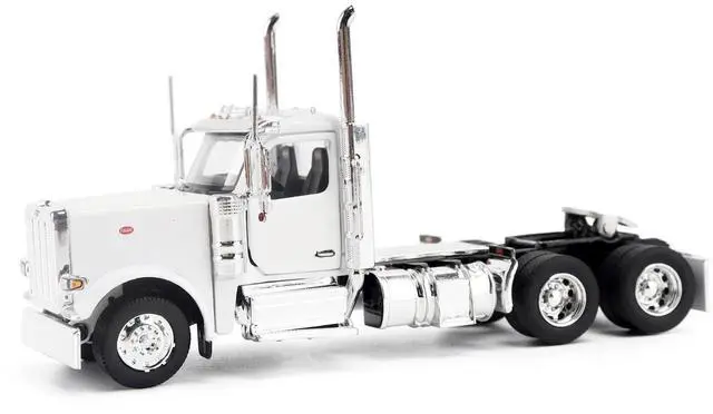 Main image of Peterbilt 589 Tandem-Axle Legendary Package Truck Tractor with 58" Sleeper White "Transport Series" 1/64 Diecast Model by Diecast Masters