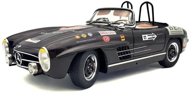 Main image of Mercedes-Benz 300 SL (W198 II) Roadster "Racing Version" Brown with Graphics Limited Ed 1/18 Diecast Model Car by CMC