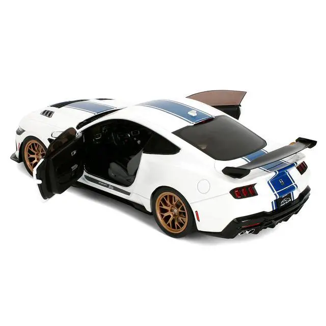 Alt view image 4 of 7 - Ford Mustang Shelby Super Snake White Metallic with Blue and Gold Wheels "Pink Slips" Series 1/18 Diecast Model Car by Jada
