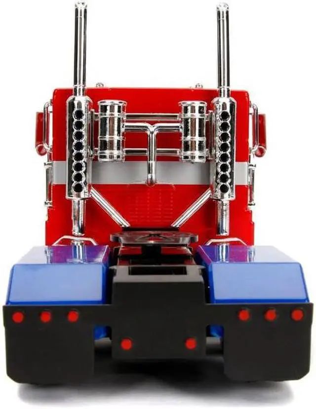 Main image of G1 Autobot Optimus Prime Truck Red w/Robot on Chassis from "Transformers" TV Series "Hollywood Rides" 1/24 Diecast Model by Jada