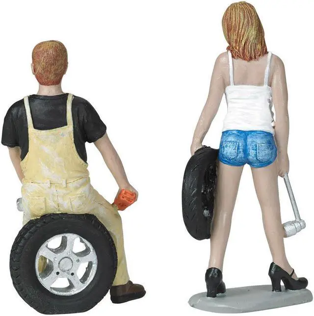 Main image of Meg and Derek Tire Brigade 2 piece Figurine Set 1/18 by Motorhead Miniatures