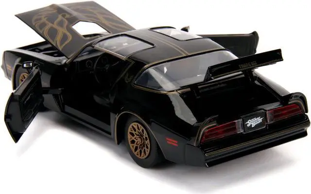 Alt view image 5 of 6 - 1977 Pontiac Firebird Trans Am Black with Replica Buckle "Smokey and the Bandit" (1977) Movie "Hollywood Rides" Series 1/24 Diecast Model Car by Jada
