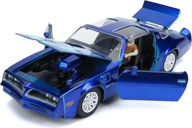 Alt view image 4 of 6 - Henry Bower\'s Pontiac Firebird Trans Am Candy Blue with Pennywise Diecast Figurine \It Chapter Two\ (2019) Movie 1/24 Diecast Model Car by Jada"""