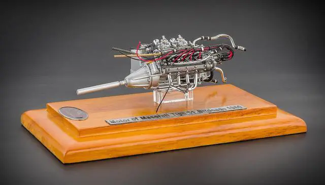 Alt view image 2 of 5 - Engine with Display Showcase from 1960 Maserati Tipo 61 Birdcage 1/18 Diecast Model by CMC