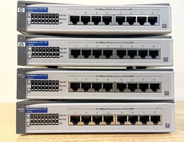Main image of Lot of 4 HP ProCurve Switch 408 8 Port 10/100 RJ45 Fast Ethernet Switch Network