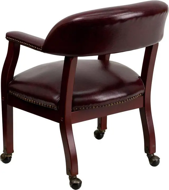 Alt view image 3 of 20 - Oxblood Vinyl Luxurious Conference Chair with Accent Nail Trim and Casters